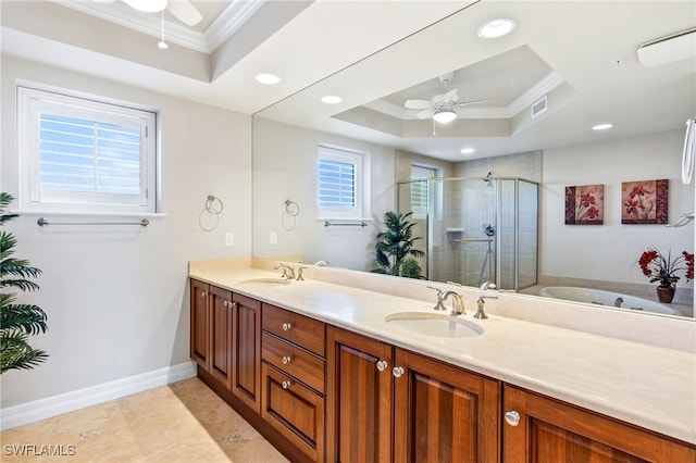 bathroom featuring ornamental molding, a shower with shower door, vanity, and a tray ceiling