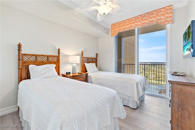 bedroom with access to outside, ceiling fan, and light wood-type flooring