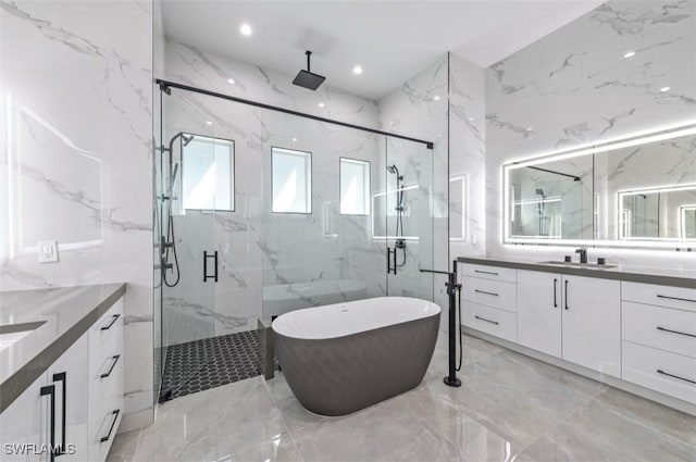 bathroom featuring vanity and plus walk in shower