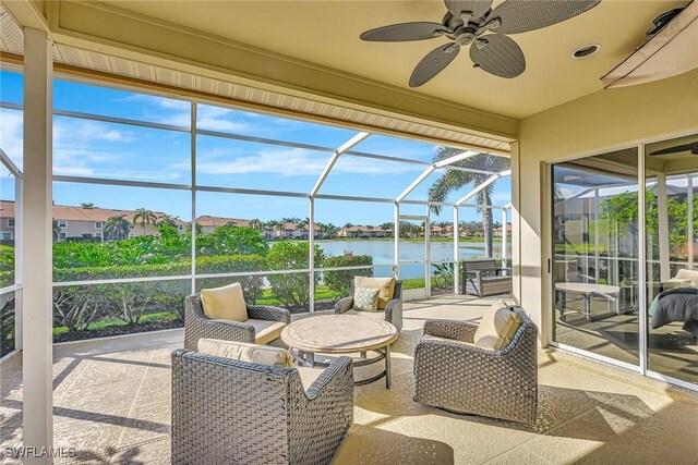 13120 Southampton Dr, Bonita Springs, FL 34135 - sunroom / solarium with a ceiling fan, a water view, and an outdoor hangout area
