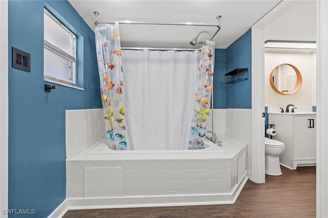 full bathroom with wood-type flooring, toilet, shower / bathtub combination with curtain, and sink