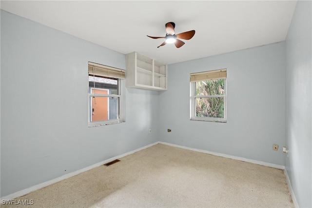 empty room featuring ceiling fan