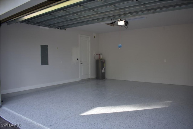 garage with a garage door opener, electric water heater, and electric panel