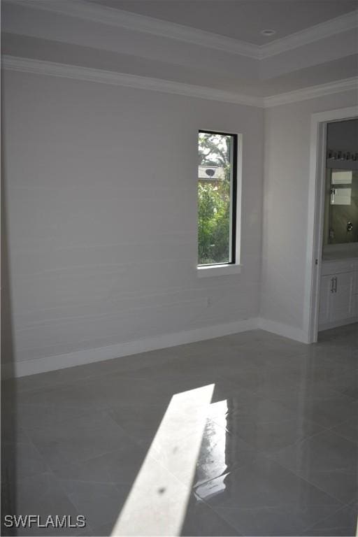 empty room featuring ornamental molding