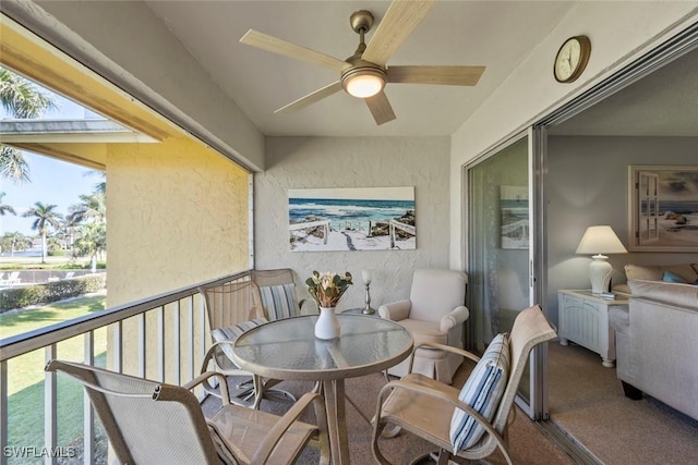 balcony featuring ceiling fan