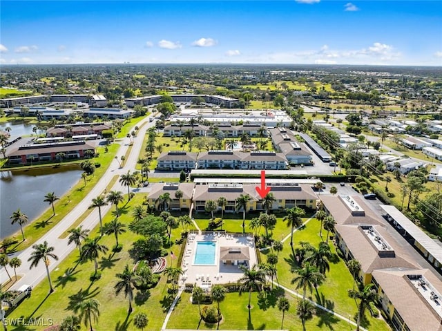 drone / aerial view featuring a water view