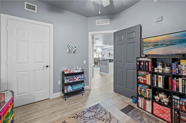 interior space featuring ceiling fan