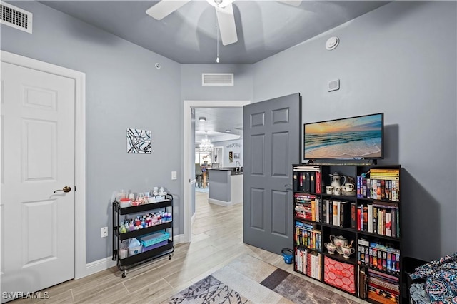 interior space featuring ceiling fan