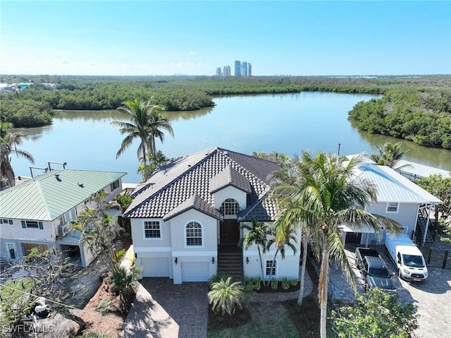 drone / aerial view with a water view