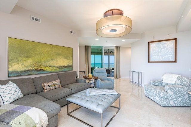 living room featuring a water view