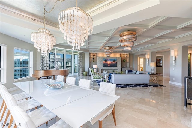 dining space featuring coffered ceiling and an inviting chandelier