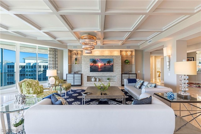 living room with coffered ceiling and beam ceiling