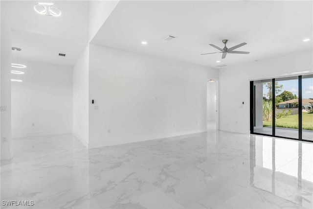 spare room featuring ceiling fan