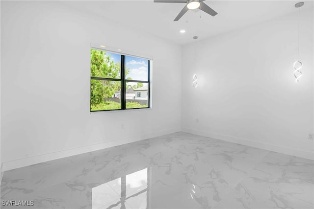 empty room featuring ceiling fan