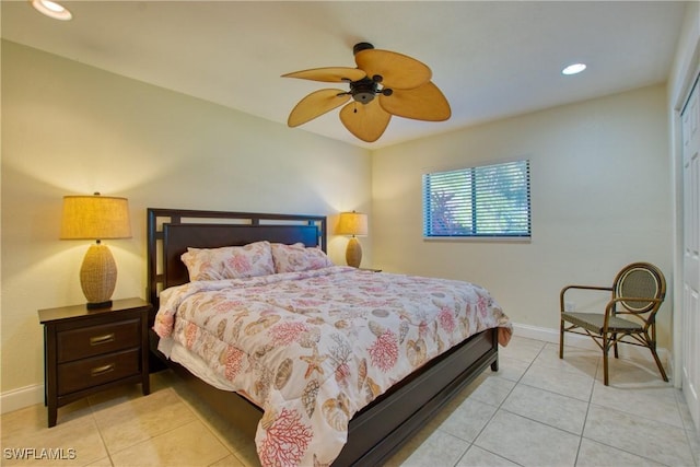 bedroom featuring ceiling fan and light tile patterned floors