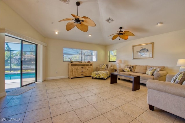 tiled living room featuring ceiling fan