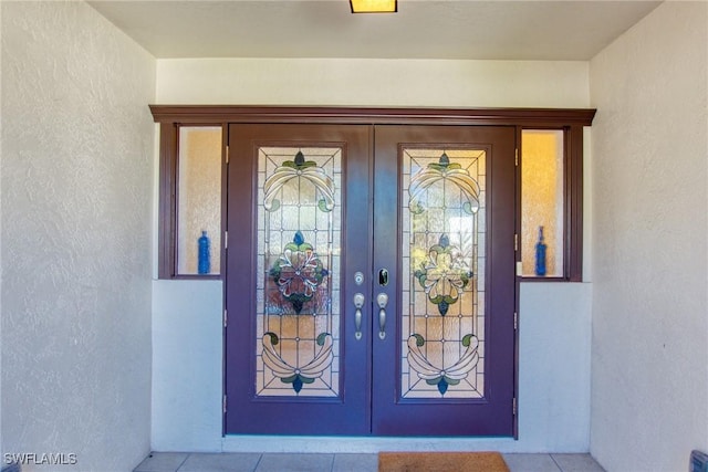 property entrance with french doors