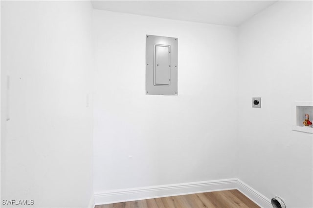 laundry area featuring washer hookup, electric dryer hookup, wood-type flooring, and electric panel