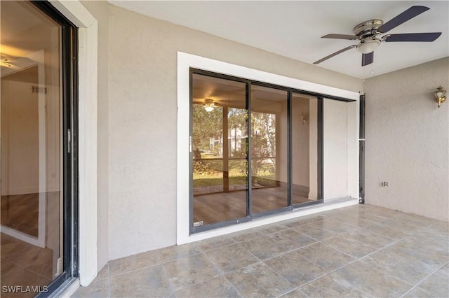 view of patio with ceiling fan