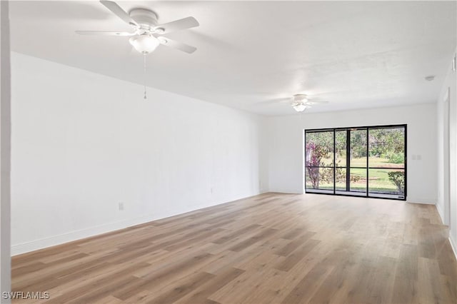 unfurnished room with ceiling fan and light hardwood / wood-style floors