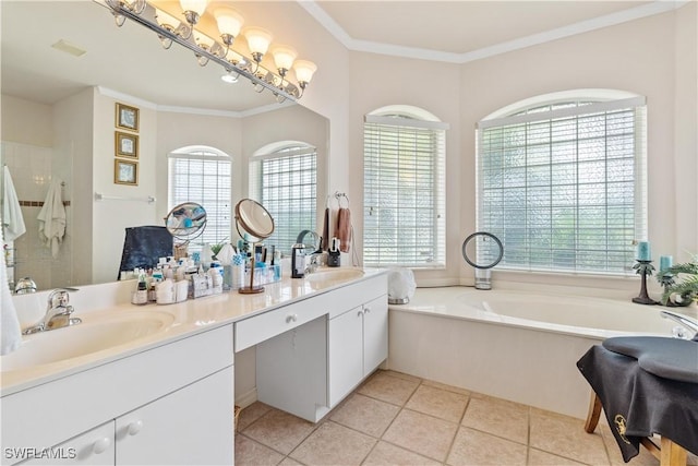 bathroom featuring tile patterned floors, vanity, ornamental molding, and a bath