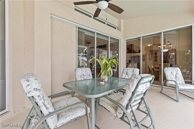 view of patio featuring ceiling fan