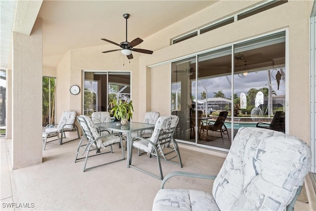 view of patio / terrace featuring ceiling fan