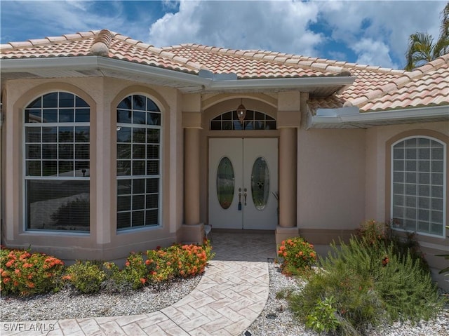 view of exterior entry with french doors