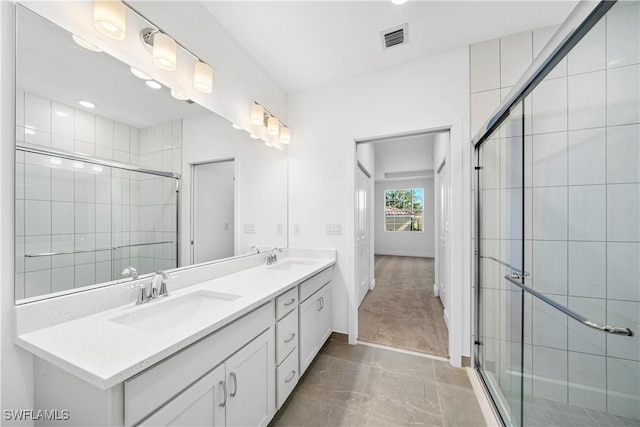 bathroom featuring vanity and walk in shower