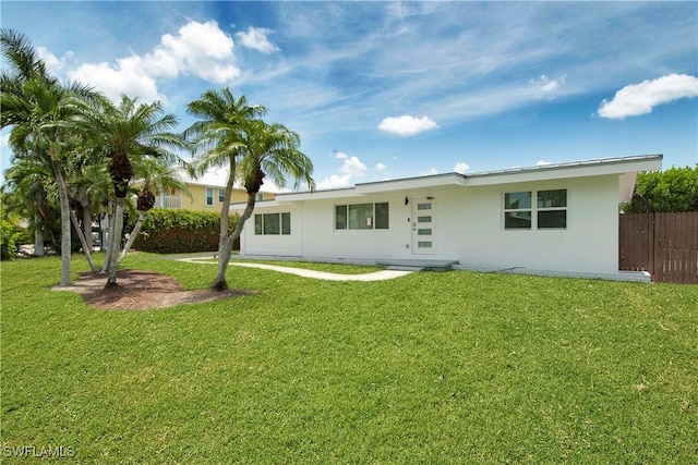 view of front of home featuring a front lawn