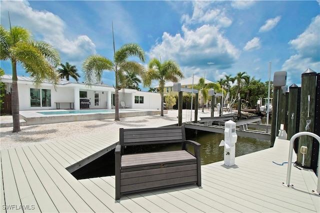 view of dock with a water view