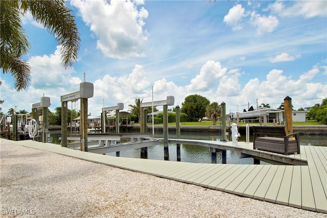 dock area featuring a water view