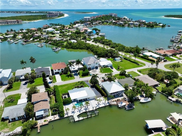 bird's eye view with a water view