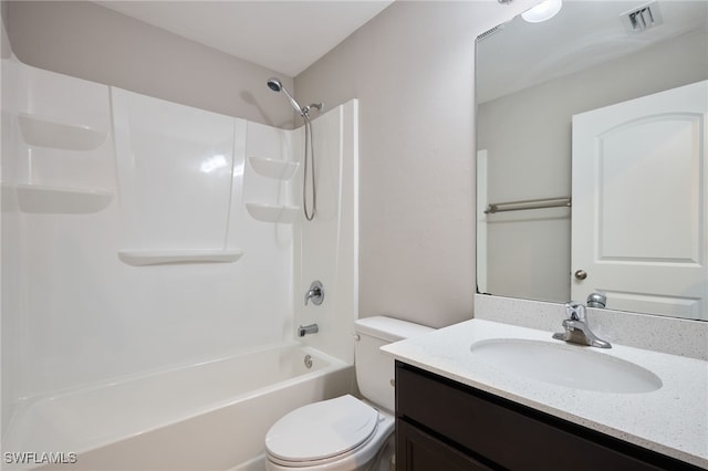 full bathroom with vanity, toilet, and washtub / shower combination