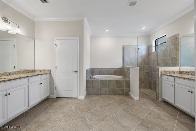 bathroom featuring tile patterned floors, vanity, separate shower and tub, and ornamental molding