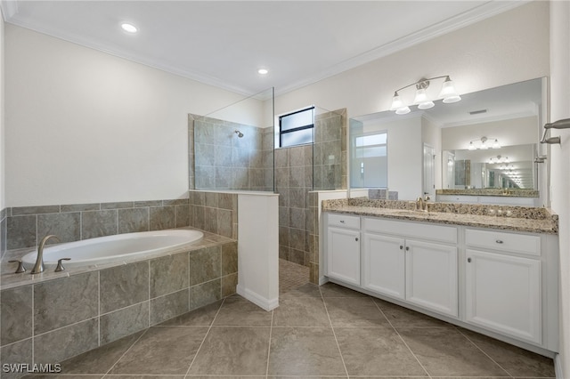 bathroom featuring tile patterned floors, vanity, crown molding, and plus walk in shower