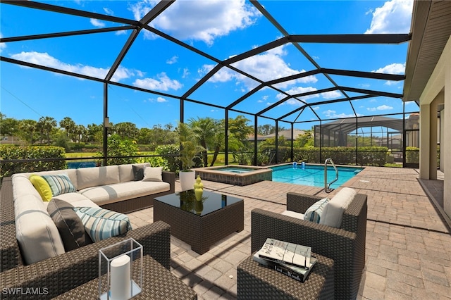 view of pool with glass enclosure, a patio area, and an outdoor living space