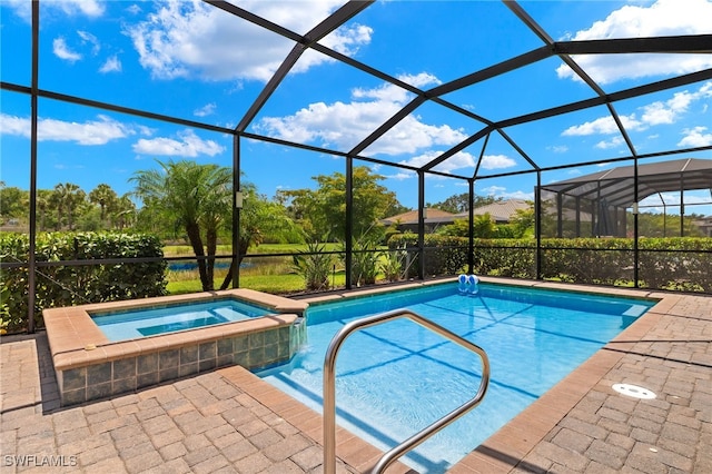 view of swimming pool with an in ground hot tub and a lanai