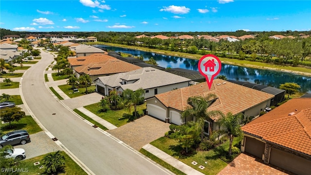 drone / aerial view with a water view