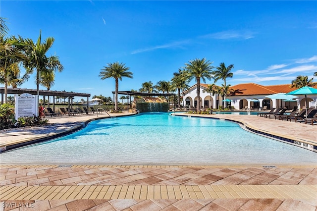 view of swimming pool featuring a patio area