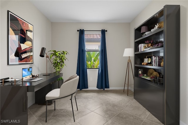 home office with light tile patterned floors