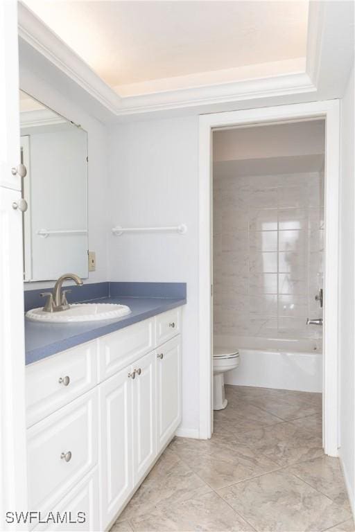 full bathroom featuring toilet, tiled shower / bath combo, and vanity