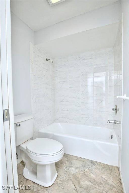 bathroom with toilet and washtub / shower combination