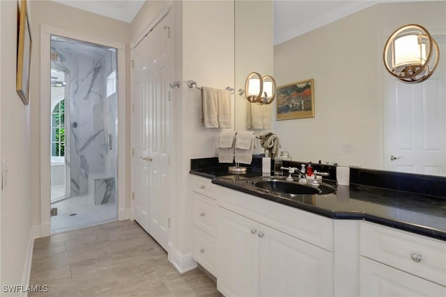 bathroom with hardwood / wood-style flooring and vanity