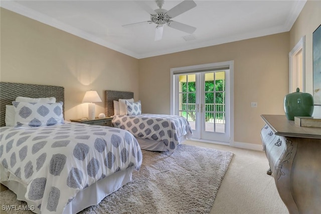 carpeted bedroom featuring access to exterior, ceiling fan, and crown molding