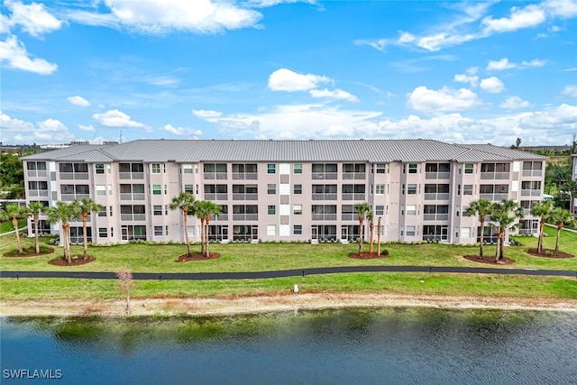 view of building exterior featuring a water view