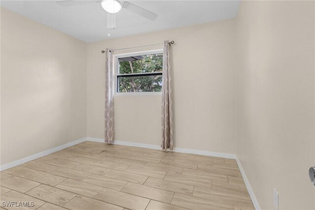 unfurnished room featuring ceiling fan