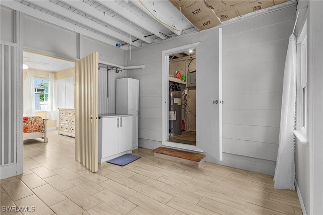 bathroom featuring electric water heater