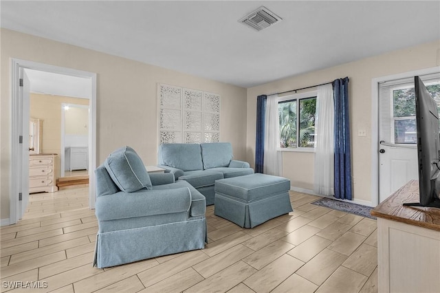 living room with plenty of natural light