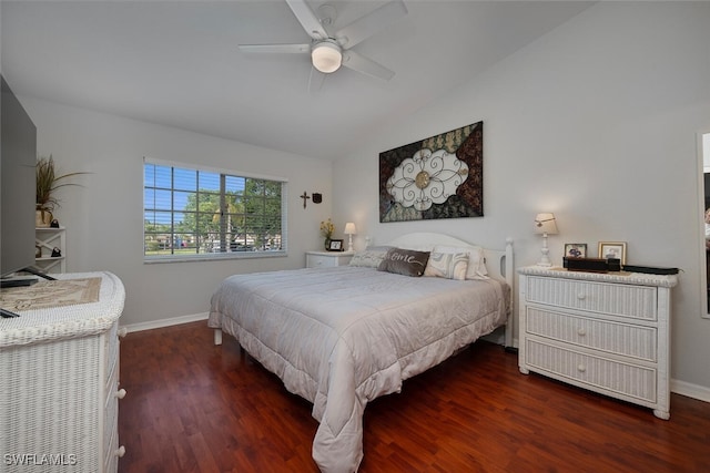 bedroom with lofted ceiling, ceiling fan, and dark hardwood / wood-style flooring